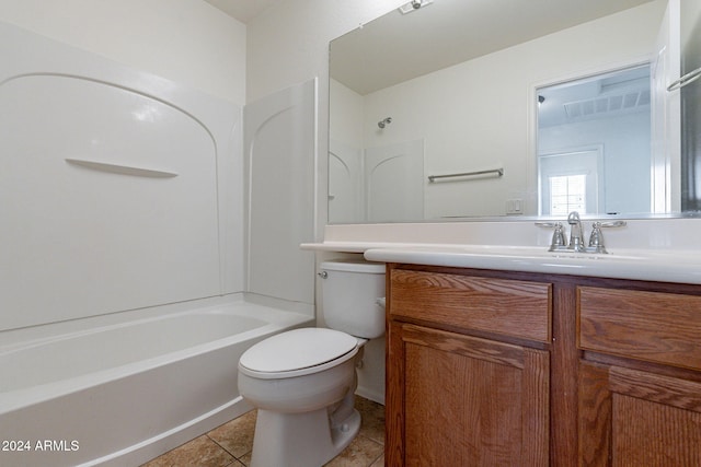 full bathroom featuring toilet, vanity, shower / bath combination, and tile patterned floors