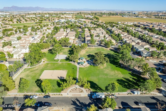 birds eye view of property with a mountain view