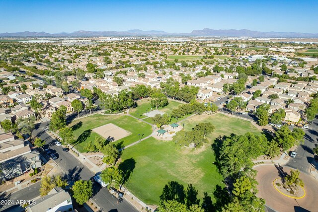 birds eye view of property with a mountain view