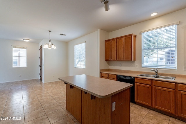 kitchen with pendant lighting, a center island, sink, black dishwasher, and a chandelier