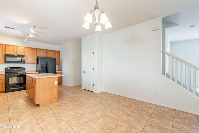 kitchen with a center island, black appliances, decorative light fixtures, light tile patterned floors, and a notable chandelier