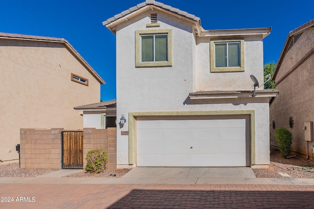 view of front of property featuring a garage