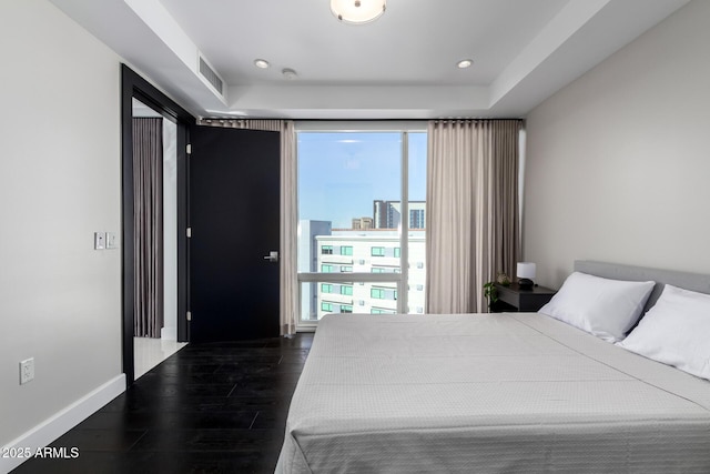 bedroom featuring dark wood-type flooring