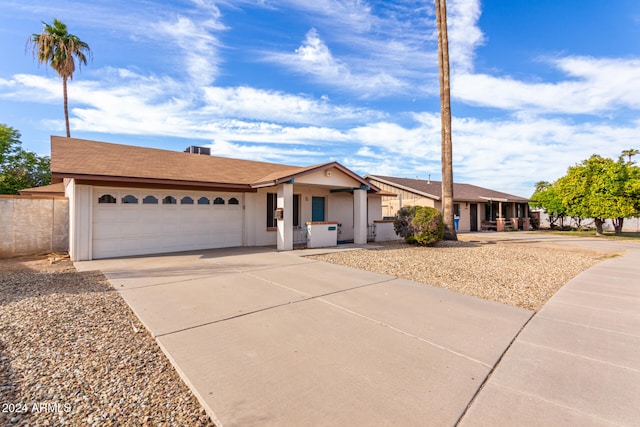 ranch-style house with a garage