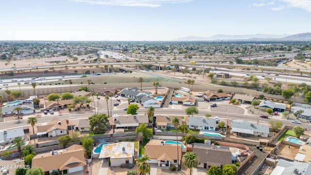 drone / aerial view featuring a mountain view