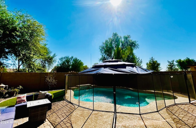 view of swimming pool featuring a patio