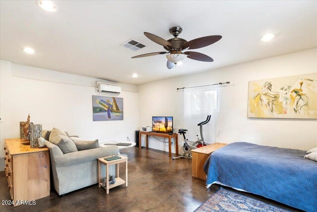 bedroom featuring ceiling fan and a wall unit AC