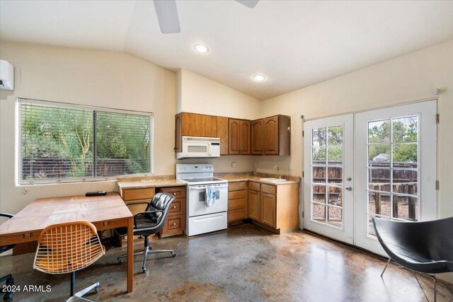 kitchen with concrete floors, white appliances, lofted ceiling, french doors, and sink