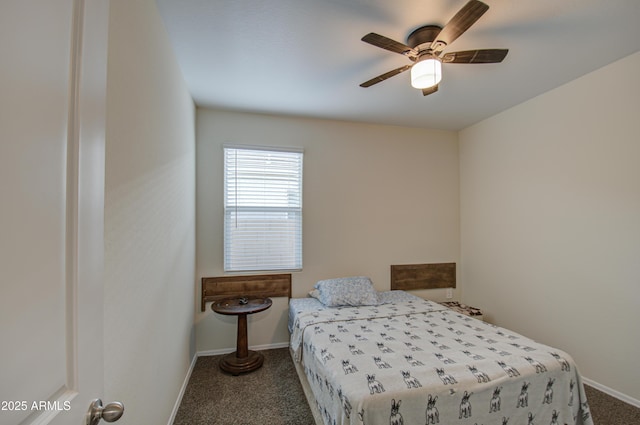 bedroom with ceiling fan, baseboards, and dark colored carpet