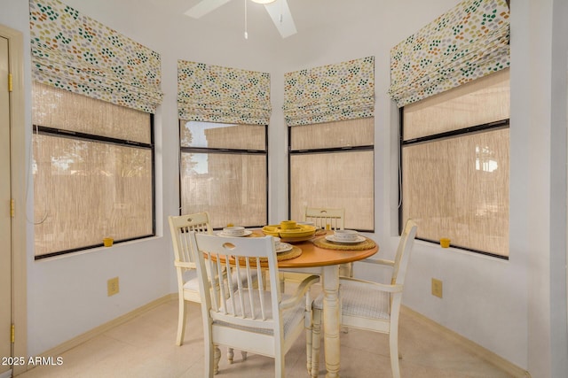 dining space with ceiling fan