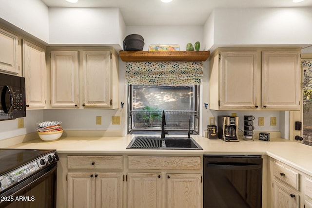 kitchen with sink, black appliances, and light brown cabinets