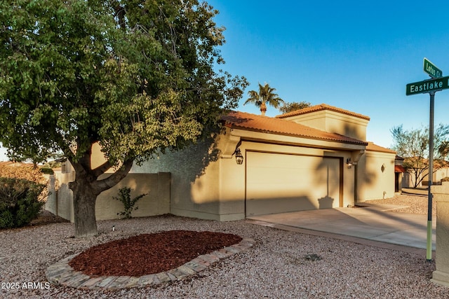 view of front of home featuring a garage