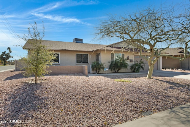 single story home with a garage