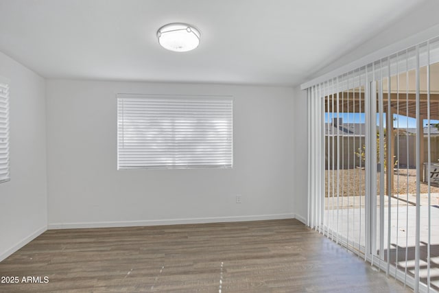 empty room featuring hardwood / wood-style floors