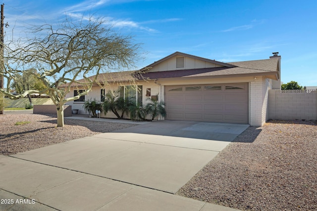 single story home featuring a garage