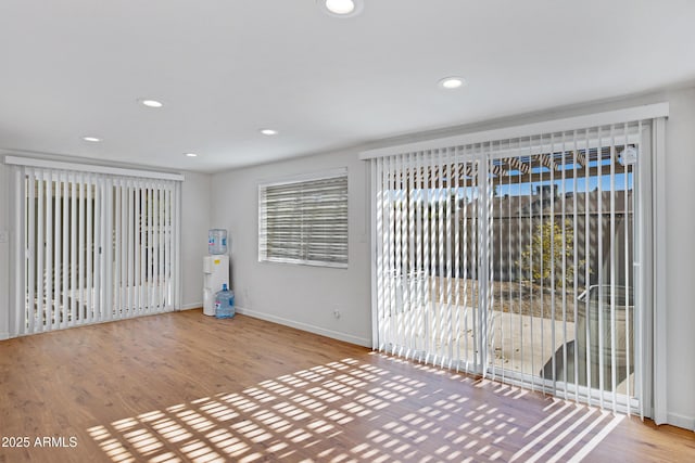 empty room with light wood-type flooring