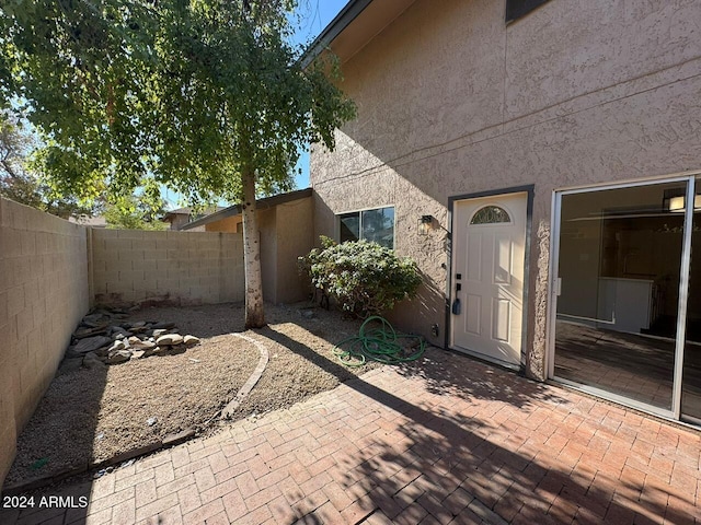 exterior space featuring a fenced backyard