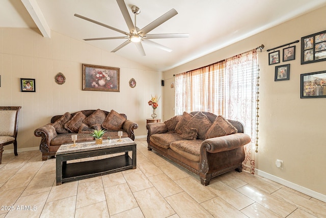 living area featuring light tile patterned floors, baseboards, lofted ceiling with beams, and ceiling fan