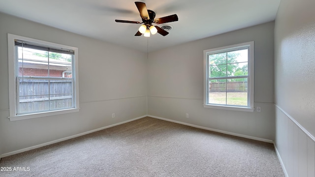 2408 W Saint Kateri Dr, Phoenix, AZ 85041 - carpeted spare room with ceiling fan, plenty of natural light, and baseboards