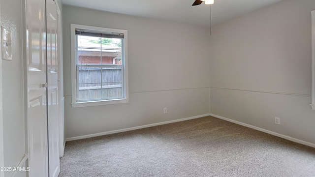 2408 W Saint Kateri Dr, Phoenix, AZ 85041 - empty room with carpet floors, baseboards, and a ceiling fan