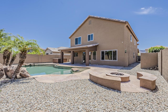 2408 W Saint Kateri Dr, Phoenix, AZ 85041 - view of swimming pool with a fenced backyard, a fenced in pool, a patio, and a fire pit