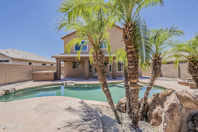 2408 W Saint Kateri Dr, Phoenix, AZ 85041 - view of pool featuring a fenced in pool, a fenced backyard, a patio area, and a jacuzzi