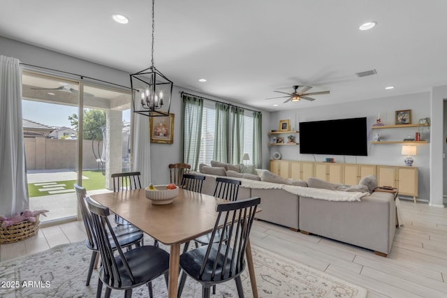 dining room with recessed lighting, visible vents, and plenty of natural light