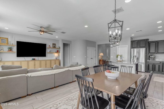 dining space featuring visible vents, recessed lighting, ceiling fan, and wood tiled floor