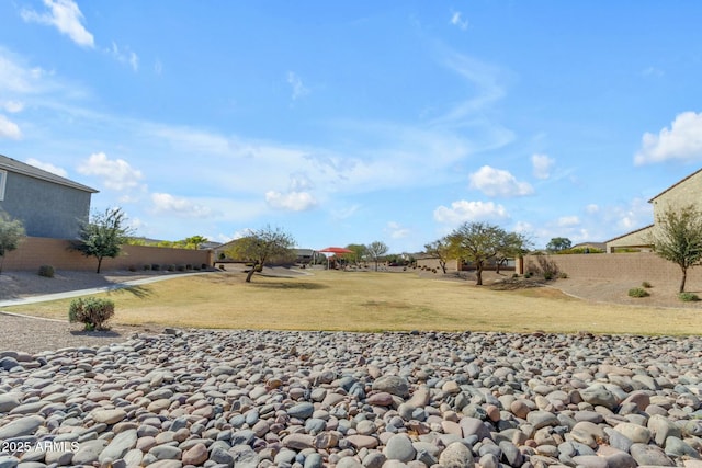 view of yard featuring fence