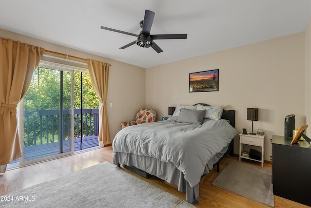 bedroom featuring light wood-type flooring, access to exterior, and ceiling fan