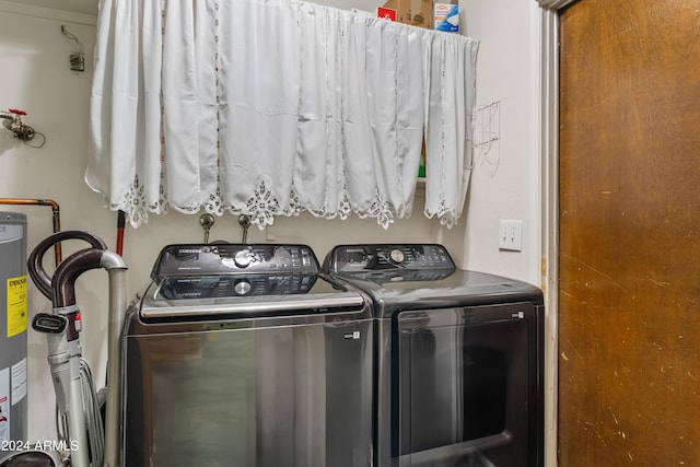 laundry area with separate washer and dryer