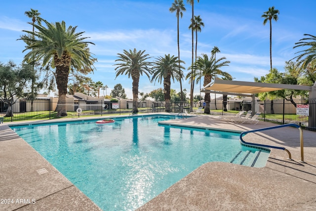 view of pool featuring a patio