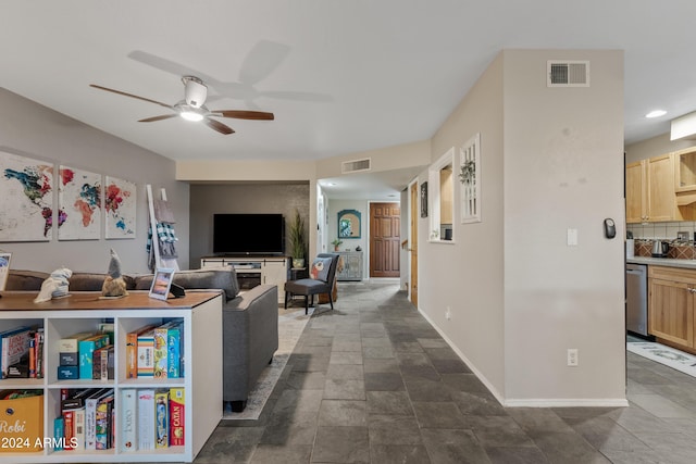 living room featuring ceiling fan