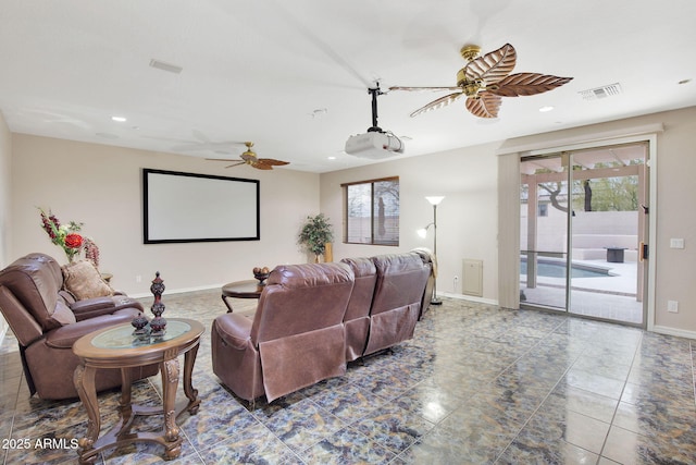 home theater room with ceiling fan, visible vents, baseboards, and recessed lighting