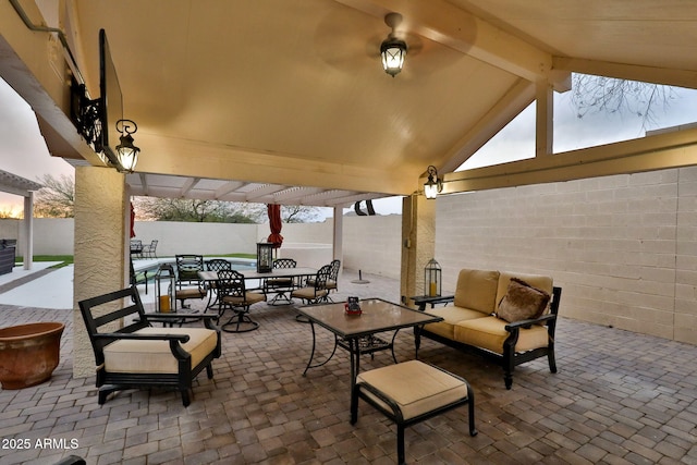 view of patio / terrace with a fenced backyard, outdoor lounge area, and outdoor dining space