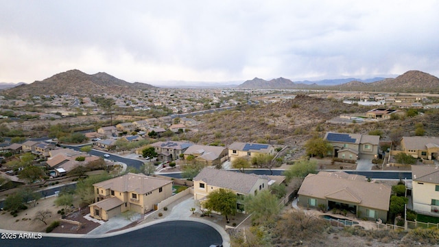 bird's eye view with a residential view and a mountain view