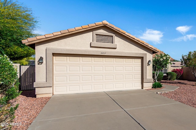 garage with fence