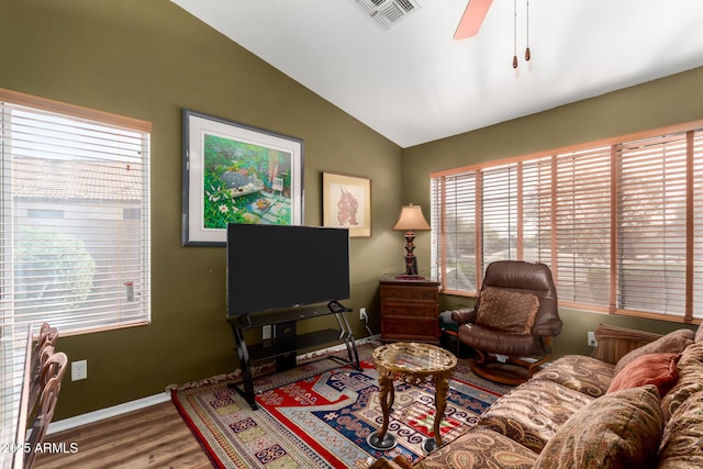 living area featuring a healthy amount of sunlight and visible vents