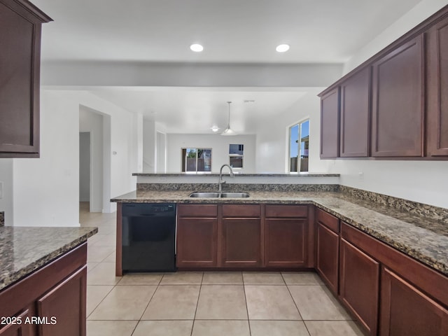 kitchen with a sink, black dishwasher, a healthy amount of sunlight, and light tile patterned floors