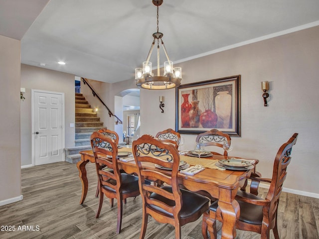 dining area with wood-type flooring