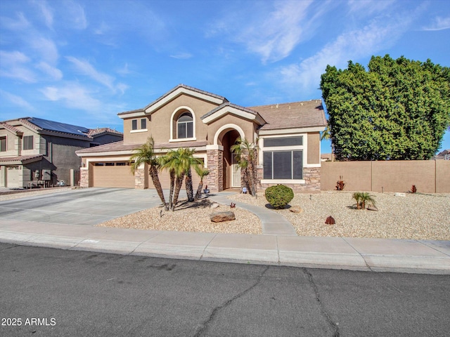 view of front of property featuring a garage