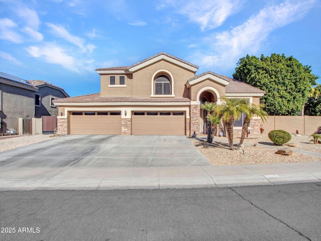 mediterranean / spanish home featuring a garage