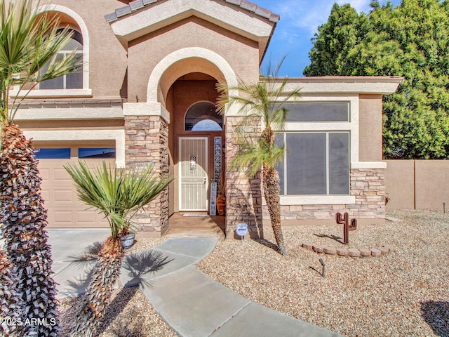 entrance to property featuring a garage