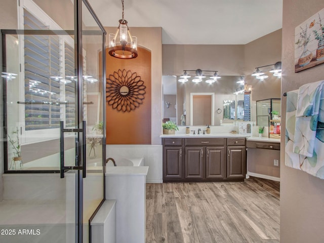 bathroom with vanity and hardwood / wood-style floors