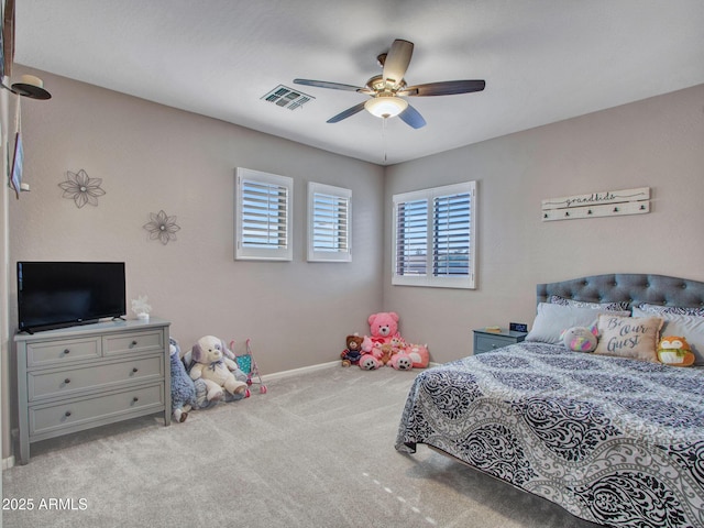 bedroom featuring light carpet and ceiling fan