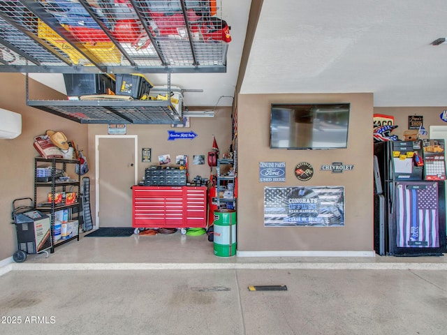 garage featuring a wall mounted air conditioner