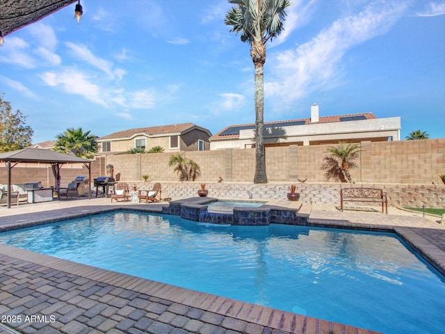 view of swimming pool with a gazebo, an in ground hot tub, and a patio