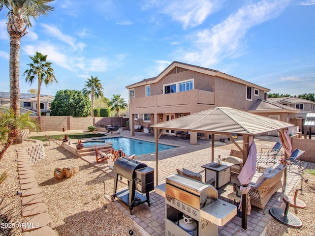 view of pool with a gazebo and a patio