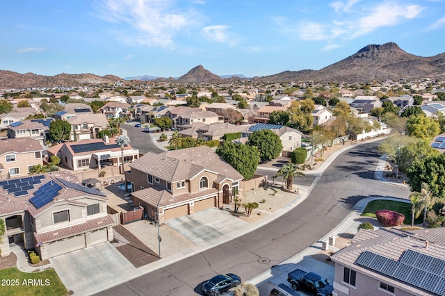 birds eye view of property featuring a mountain view