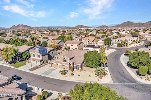 birds eye view of property featuring a mountain view